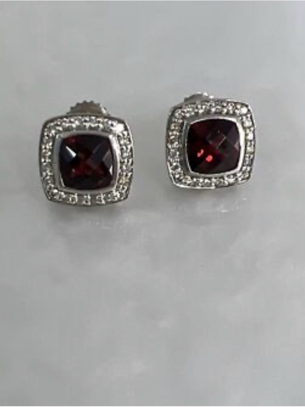 Authentic David Yurman petite Albion studs. 5mm rhodolite
